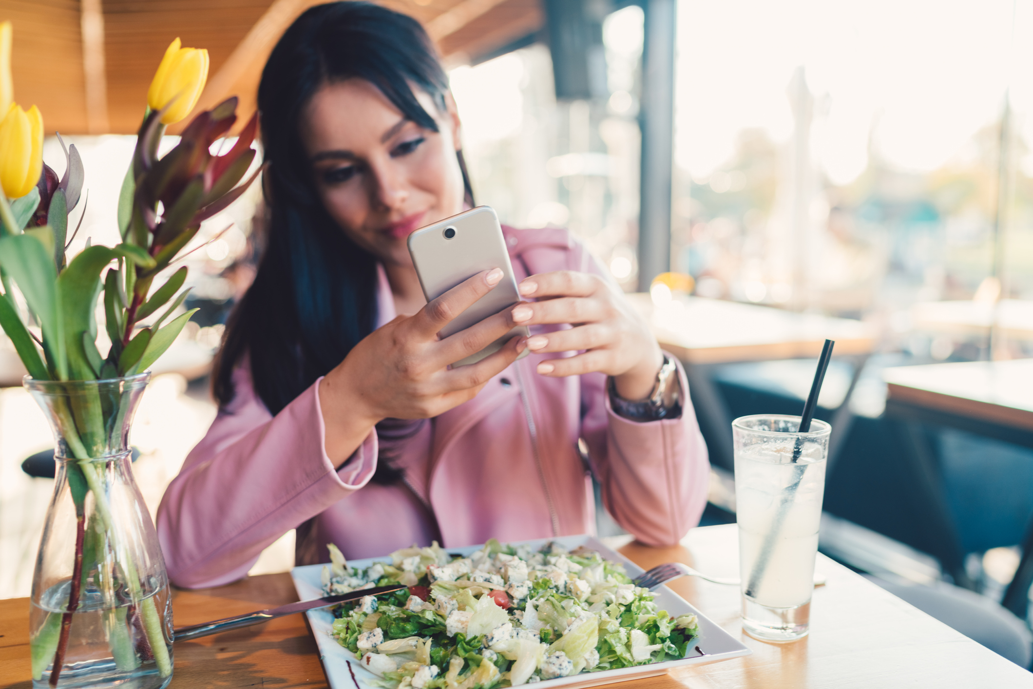 woman eating at restaurant